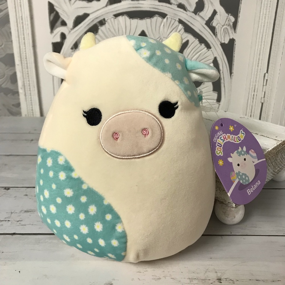 Squishmallows “Belana” the Easter Cow with Blue Daisy Flowers